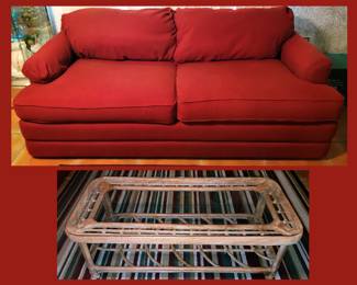 Comfy Sleeper Sofa and Glass Top Rattan Coffee Table; There is a Pair of Matching End Tables