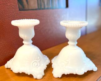 Two sets of milk glass candle holders
