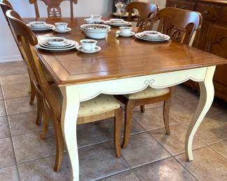 Ethan Allen Dining Table
Six Matching Chairs
Two Leaves

68” (L) x 40” (W) x 30.5” (H)
Measurements withOUT leaves