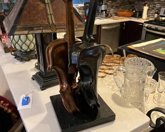 Artist French: Philippe Guillerm - Title: The Tango
Circa 2000
Medium 2 solid bronze violins in different Patina’s
Size approximately 30” tall
Condition beautiful
Value retail $3,500
Base black Granite
Certificate of Authenticity available