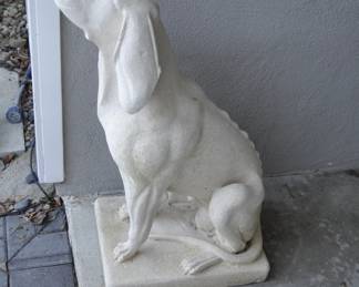 Pair of cast stone seated Hounds
