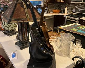 Artist French Philippe Guillerm - Title: The Tango
Circa 2000
Medium 2 solid bronze violins in different Patina’s
Size approximately 30” tall
Condition beautiful
Value retail $3,500
Base black Granite
Certificate of Authenticity available