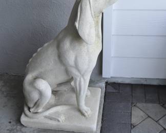 Pair of cast stone seated Hounds