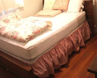 167 - Full Size Bed & Bedding - 43" x 63" x 82" Looks to be a full-size mattress with a Queen Size Bedframe