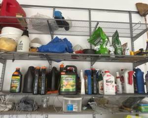 Variety of tools and gardening/yard supplies