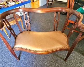 Carved loopback settee.  Beautiful!