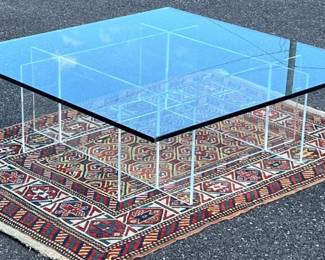 Contemporary acrylic and glass top coffee table