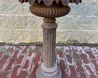 Cast iron pedestal birdbath with fluted basin