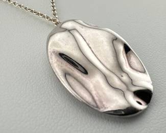 Sterling silver Peretti Sagittarius pendant is marked 1000/Tiffany and Co./signed Elsa Peretti