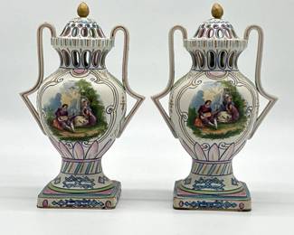 Pair of ceramic openwork urns