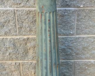 Cast iron fluted hitching post in old green paint has ball finial