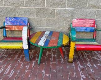 Three piece outdoor lounge chairs and table by Aaron Jackson