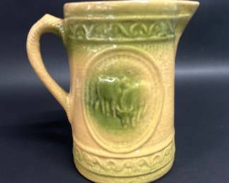 Antique stoneware buttermilk jug