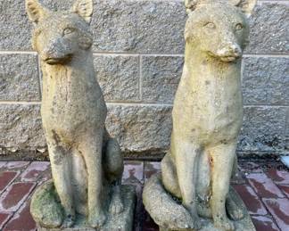 Pair of cast concrete fox statues