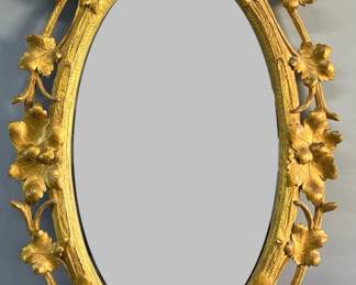 Classic Carvers’ Guild Black Forest oval mirror