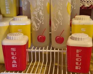 Vintage Federal Glass TOM COLLINS lemon and cherry glasses. Vintage plastic warehouse yellow and red containers