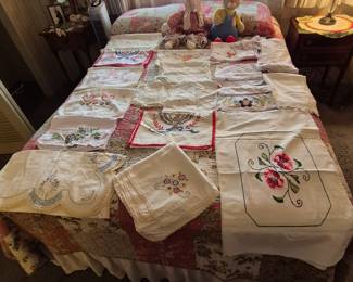 Double bed with vintage linens