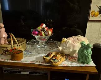 Giant piggy bank and collectibles. Vintage ornaments