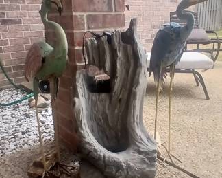 Outdoor Fountain and Metal Bird Artwork