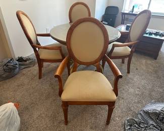 4 upholstered, wooden armchairs