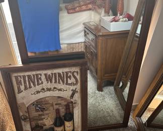 Wood-framed mirror and Carved wal decoration for the bar area