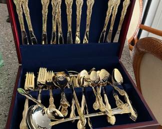 Stainless flatware set service for 12 [missing pieces]