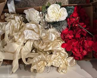 Assorted decorative ribbons, flowers and bows
