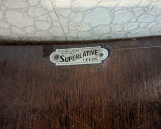 A1 - $600. Superlative Leeds Art Deco Cabinet. Registered Design No.859318 Imperfections noted in pictures. measures 48" wide x 11" deep x 49.5" tall.