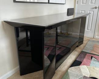 A14 - $225. High Gloss Side Board. Measures 76" wide x 24" deep x 32" tall.