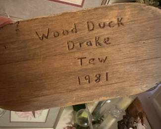 A75 - $25 Wood Duck Decoy signed "TEW". Measures 11.5" long.