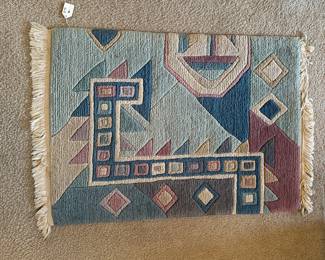 A40 - $40. Masterlooms 100% Wool Area Rug. Measures 2'x3'.