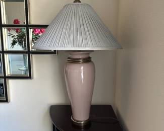 A7 - $30. Pink Table lamp with decorative metal rings. Measures 32" tall.