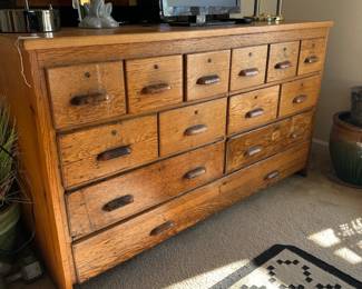 A38 - $400. Hardware / Apothecary Cabinet. All drawers slide. Measures 60" wide x 23" deep x 35" tall.