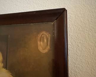 A26 - $30. Art Deco Framed Print. Lady in a Gold Coat. Frame is old and needs tightened. Measures 17.5" x 21.5" tall.