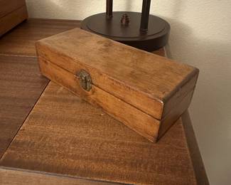 A62 - $15. Decorative Antique Wooden Box Measures 9" wide x 3.5" deep x 2.5" tall.