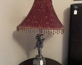 A50 - $60. Cherub Table Lamp. Measures 30" tall.