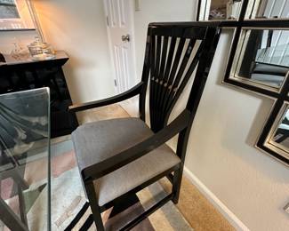 A3 - $200. Chrome Sawhorse Base with LARGE Glass top. Glass measures 5' x 7'. You will need a couple STRONG people to move the glass out! Includes 6 regular chairs. 2 arm chairs.