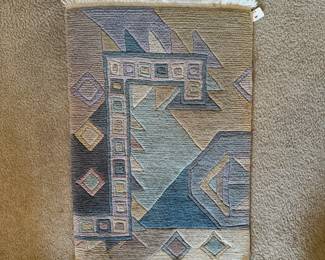 A41 - $40. Masterlooms 100% Wool Area Rug. Measures 2'x3'.