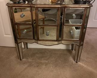 A72 - $30. As is - mirror in the center is cracked. Measures 38.5" wide x 17" deep x 32" tall.