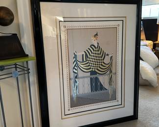 A32 - $1200. Erte #204/300 "The Balcony". Purchased from Leland Little 2019- description given: Serigraph in colors with foil and embossing, pencil signed and numbered 204/300 lower margin, accompanied by gallery paperwork, in black lacquer frame with matting. Measures 44.5" wide x 55" tall.