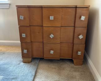 A6 -$20. 3 Drawer cabinet. Minor imperfections, pulls need to be tightened. Measures 26" wide x17.5" deep 24" tall.