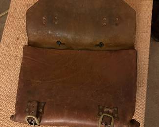 A83 - $50. Antique Leather Messenger Bag. Measures 18" wide x 13" tall.