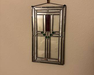 A65 - $65. Small Unsigned Stained Glass Panel. Measures 7" wide x 12" tall.