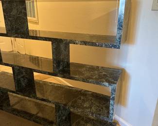 A35 - $125. 4 Level Shelving. Measures 60" wide x12" deep x 47" tall.