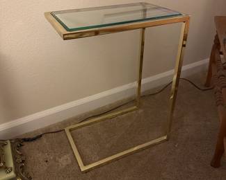 A59 - $35. Metal & Glass Side Table in very good condition! Measures 10" wide x 15" deep x 20" tall.