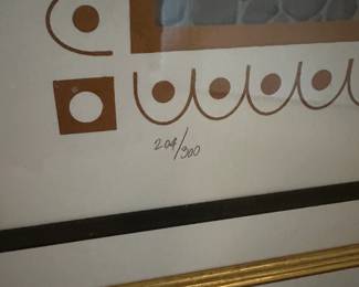 A32 - $1200. Erte #204/300 "The Balcony". Purchased from Leland Little 2019- description given: Serigraph in colors with foil and embossing, pencil signed and numbered 204/300 lower margin, accompanied by gallery paperwork, in black lacquer frame with matting. Measures 44.5" wide x 55" tall.