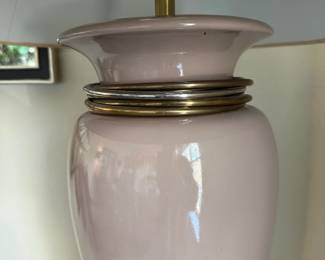 A7 - $30. Pink Table lamp with decorative metal rings. Measures 32" tall.