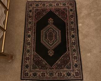 A84 - $40. Wool Rug - no tag. Measures 24.5"Wx38"L