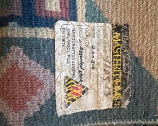 A40 - $40. Masterlooms 100% Wool Area Rug. Measures 2'x3'.