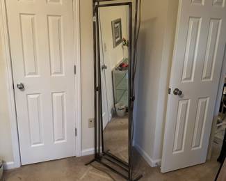 A31 - $150. Decorative Metal Floor Mirror. Measures 23" wide x 69.5" tall.